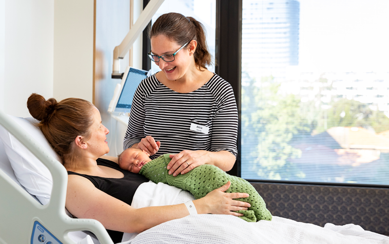 Photo of midwife with patient