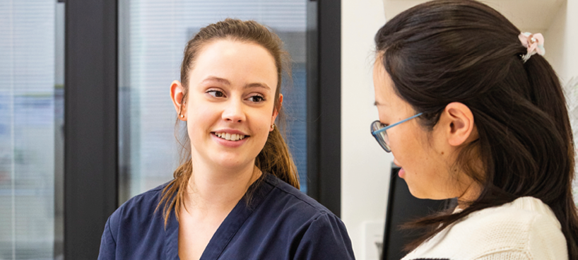 Photo of midwife with patient